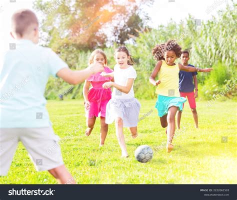 Group Barefoot Kids Playing Football On Stock Photo 2222061503
