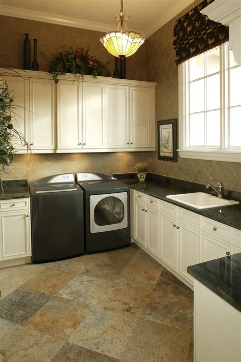 If selecting ceramic, porcelain or vinyl tile for the kitchen floor, the goal should not be to match the flooring to the countertop as it might look. A green marble countertop and matching appliances. The floor is a di… | Cost of kitchen cabinets ...
