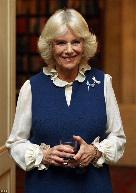Camilla Looked Elegant In A Navy Dress And Cream Blouse With A Ruffled Neckline Van Cleef And