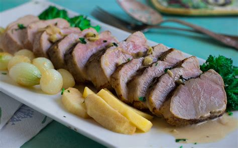 Pork tenderloin, seared in butter, then roasted, served with caramelized onions and sauteed fresh figs. Pork Tenderloin with Brandy Cream Sauce, Apples and Glazed ...