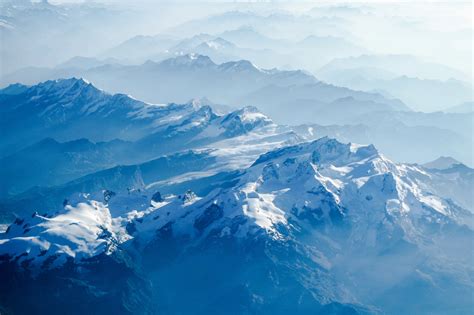 Snow Capped Mountains At Daytime Photo Free Mountain Image On