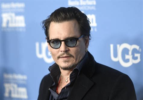 Love Turned Sour Johnny Depp Changes Amber Heards Slim Tattoo Into