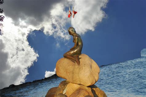 The Little Mermaid Is A Bronze Statue By Edvard Eriksen Depicting A Mermaid The Sculpture Is