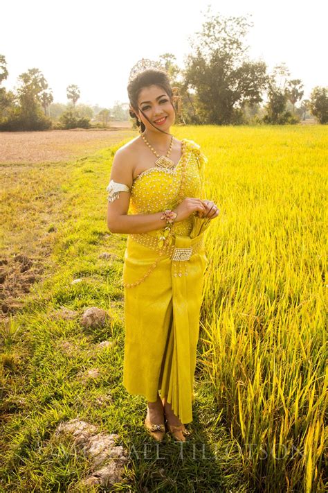 beautiful cambodian bride in traditional wedding dress in a rice field traditional wedding