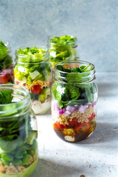 Divide the remaining salad ingredients between the four mason jars, in this order: 5 Mix and Match Mason Jar Salad Recipes for Easy Lunches!