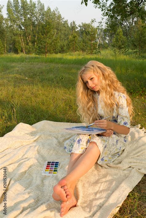 Beautiful Charming Barefoot Long Curly Blonde Hair Teenage Girl Wearing A Long Light Dress