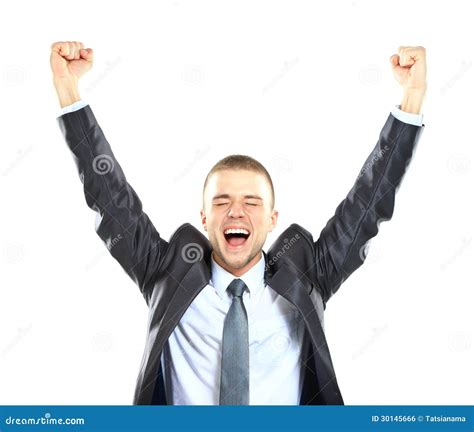 Excited Handsome Business Man With Arms Raised In Success Stock Photo