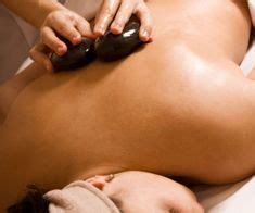 Like Two Warm Hands Massaging You The Hot Stone Massage Is Deeply