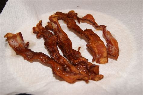 Extra Crispy Bacon Baked On Parchment Paper In Oven At 450 Scrum