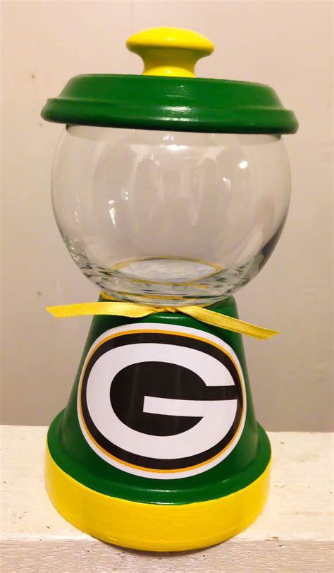 Janus films 215 park ave. Green Bay Packers candy jar http://squareup.com/market ...