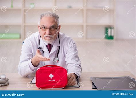 Old Male Doctor Holding First Aid Bag Stock Image Image Of Medical Emergency 269014705