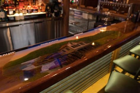 Top dog bar & grill. New Chimney Rock Inn in Flemington features bar tops with ...