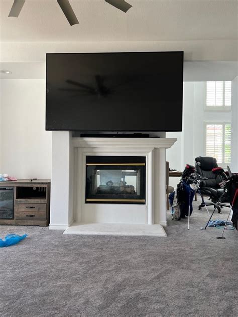 Can I Mount A Tv Above My Fireplace Over The Top Mounts