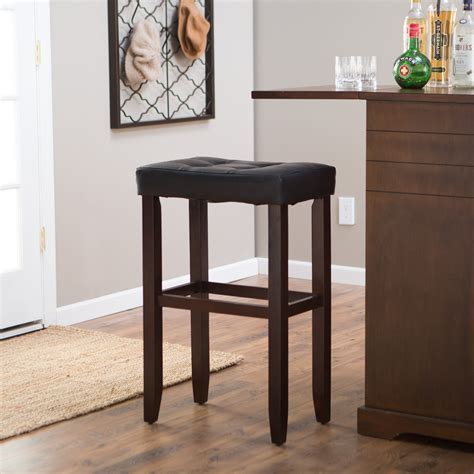 Tall bentwood, maple, swivel stool by thonet features a chrome footrest at 12 inches height and a seat that is 17.5 inches square. Have to have it. Palazzo 32 Inch Saddle Bar Stool - Black ...