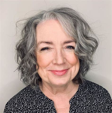 The hair is colored and the hair on the top is styled in loose and long waves. Wavy Gray Bob Over 60 in 2020 | Short hair styles, Thick ...