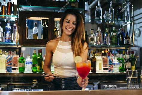 Female Bartender Serving Cocktail Lime Liquor Stock Photo