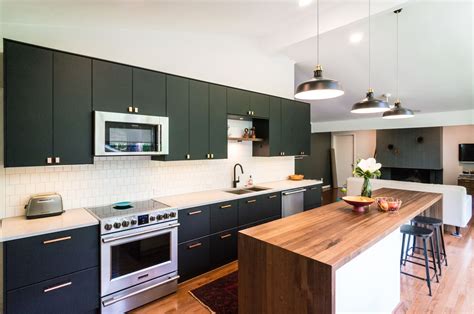 Ikea varde kitchen butcher block island with stainless steel. Modern IKEA kitchen with clean lines and smart storage ...