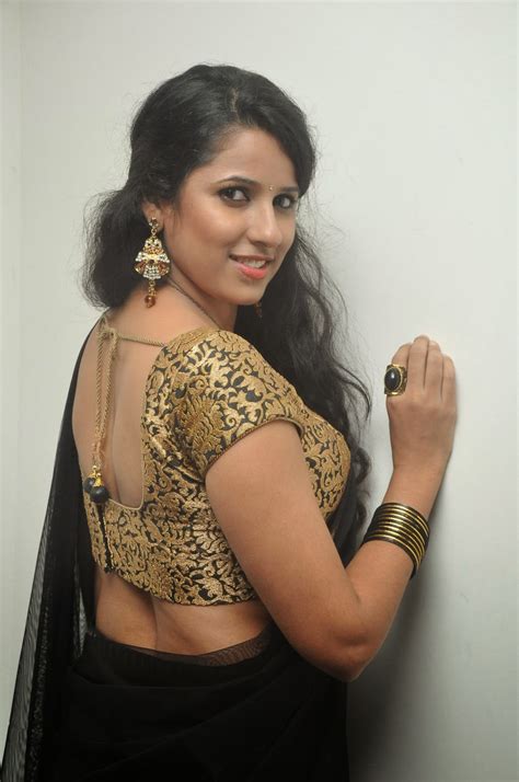 sravya reddy in black saree at everest photo exhibition stylish designer sarees lehengas