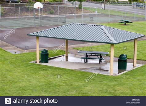 Extra space is required for players. Covered picnic area in new neighborhood park. Tennis court ...