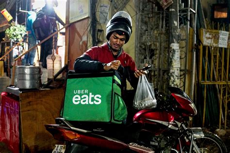 Uber Sells Food Delivery Business In India The New York Times
