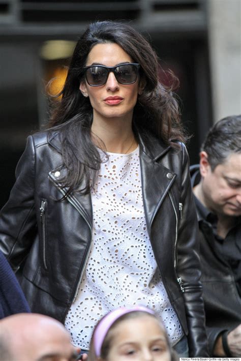The temperature was at least minus one, there was snow and sleet and she. Amal Clooney's Dog-Walking Outfit Is Perfect, Obviously