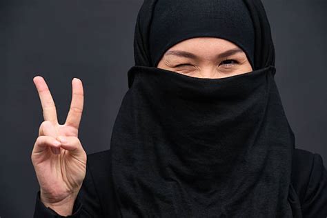 200 Middle Eastern Woman Covering Her Face With Black Veil Stock
