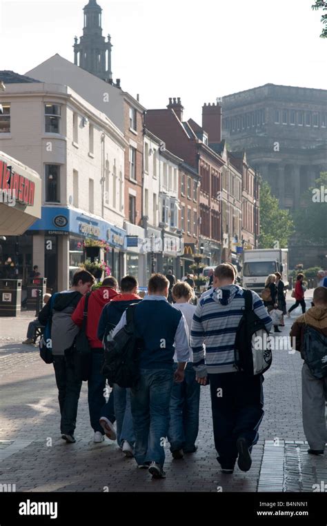 Young Men Walking In Friargate One Of The Main Pedestrianised Shopping