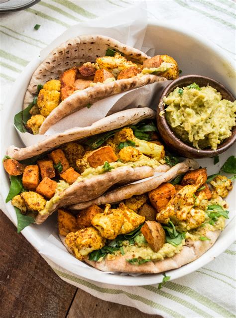 The health benefits of broccoli and cauliflower are more than enough to get me to eat this dish. Sweet Potato and Cauliflower Curry Wraps | Lemons and Basil