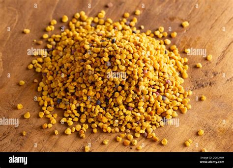 A Pile Of Pellets Of Yellow Bee Pollen Stock Photo Alamy