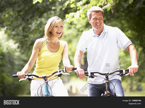 Couple Riding Bikes Image And Photo Free Trial Bigstock