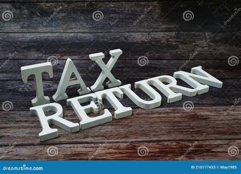Tax Return Word Alphabet Letters On Wooden Background Stock Image