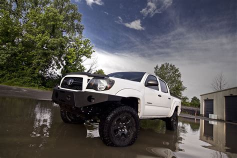 Off Road Monster Modified White Toyota Tacoma — Gallery