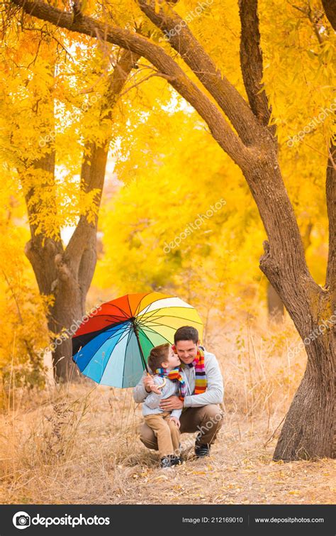 Little Boy His Father Colorful Umbrella Walk Autumn Yellow Forest Stock