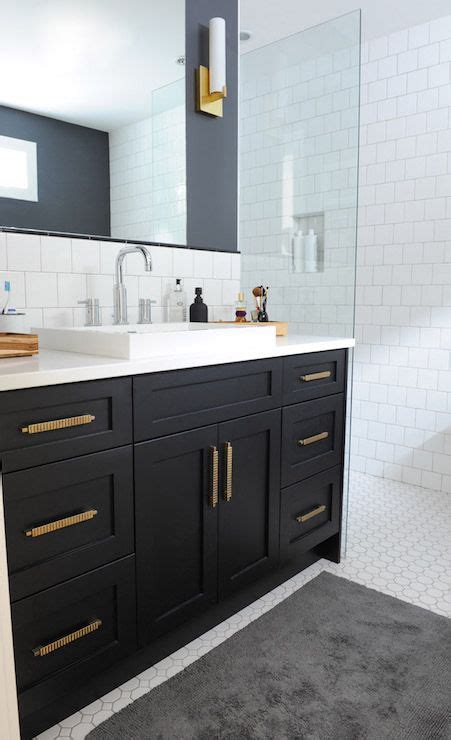 Your bathroom hardware collection may include towel bars or rings, taps, hooks, faucets, cup holders, toilet paper holders, toilet brush holders, and other fixtures. Black Bathroom Vanity with Gold Hardware, Vintage ...