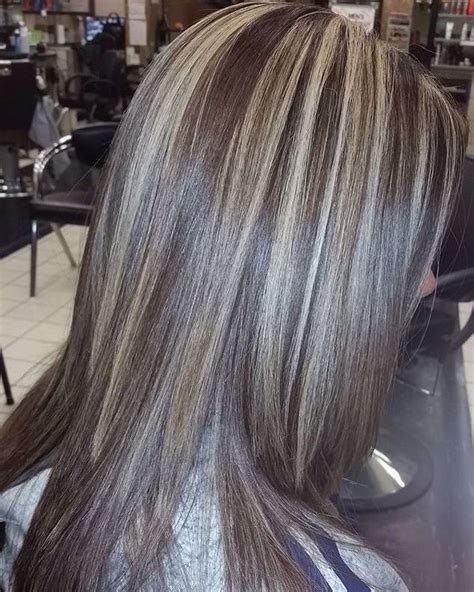 The hair is significantly lighter on the bottom. Chunky blonde highlights on dark brown hair | Brown hair ...