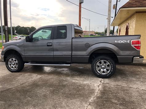 5.0l v8 and 4 wheel drive. Ford F-150 XLT SuperCab 4X4 | Crown Auto Sales, Baton Rouge