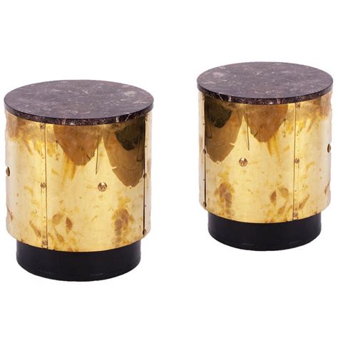 The harbor house drum stool offers a simple and unique update for your home décor. Pair of Brass Drum Side Tables at 1stdibs