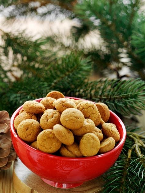 Crispy, peppery and perfect with coffee or port. Traditional danish Christmas cookies on ... | Stock Photo | Colourbox