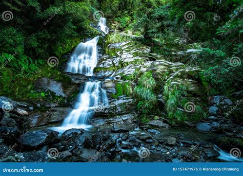 Beautiful Waterfall Falling From The High Mountain Midday Scenery With