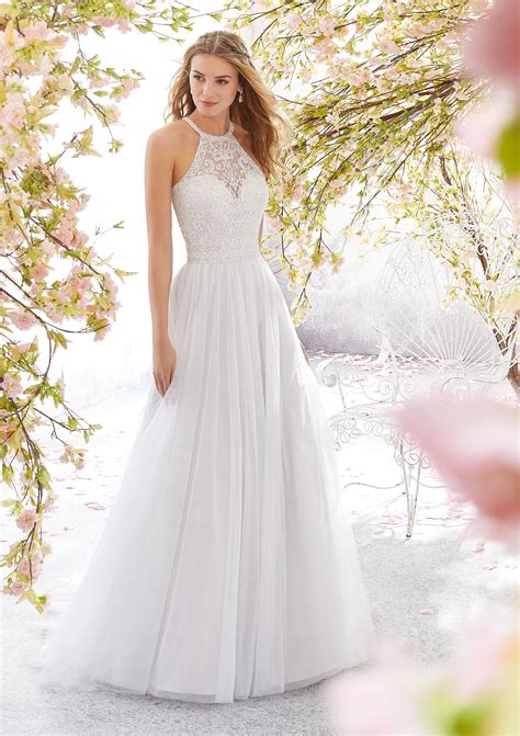Brides will often have a rough idea of the style of wedding dress they're after before beginning the wedding planning journey, but this may change with the help. Leilani Wedding Dress | Style 6898 | Morilee