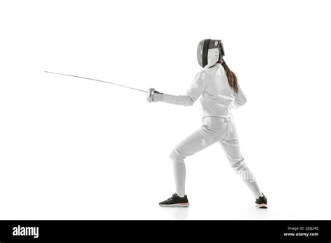 One Sportsman Female Fencer In White Fencing Costume In Action Motion Isolated On White