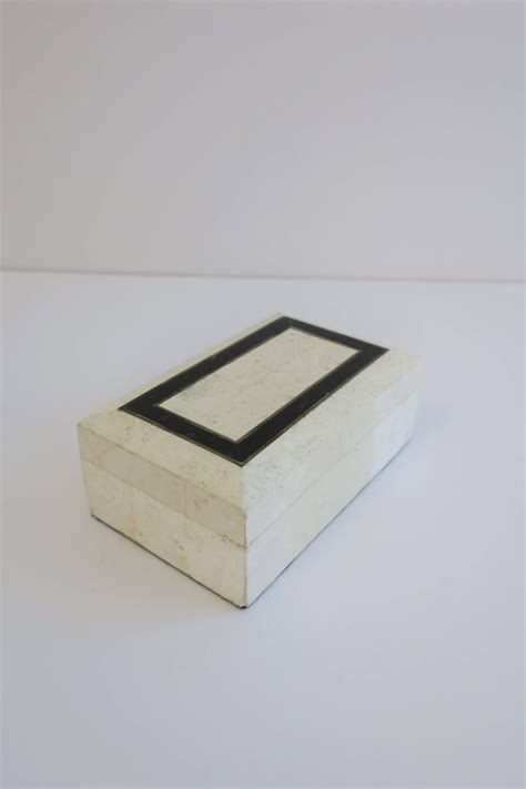 This stone is especially good for exterior, interior, wall cladding, sink, basin, mosaic. Black and White Travertine Marble Box For Sale at 1stdibs