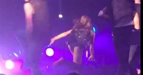 Ariana Grande Takes A Stage Tumble
