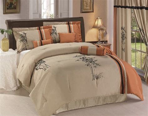 The perfect comforter set is soft, warm, and durable. Taupe and orange bedding | Taupe bedding sets, Comforter ...