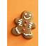 Gingerbread Cookie On A Festive Orange Background  Free Stock Image