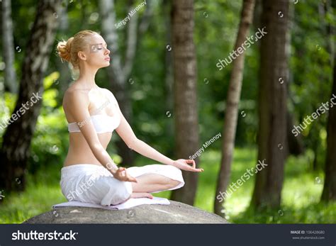 Yoga bring the people is abundant sources of energy, healthy. Young Girl Doing Yoga In The Park Stock Photo 106428680 ...