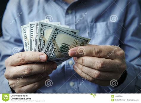Cash In Hands Profits Savings Stack Of Dollars Stock Photo Image