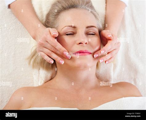 Face Massage In Spa Environment Macro Attractive Woman With Close Eyes