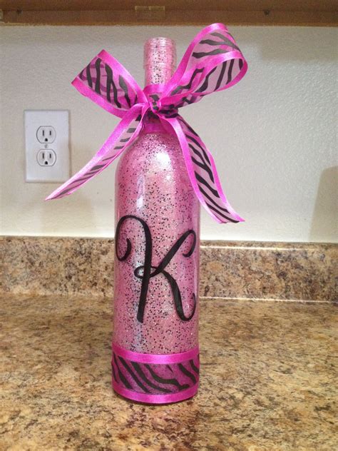 Here's another project idea for wine bottles. Pink zebra glitter wine bottle | Glitter wine bottles, Bottle crafts, Glitter wine