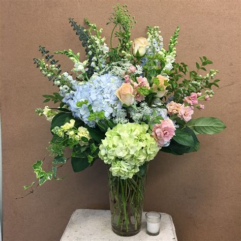 Evans Peach Green And Blue Vase Arrangement In Peabody Ma